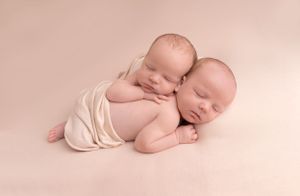 twins simple posed carefully cuddling