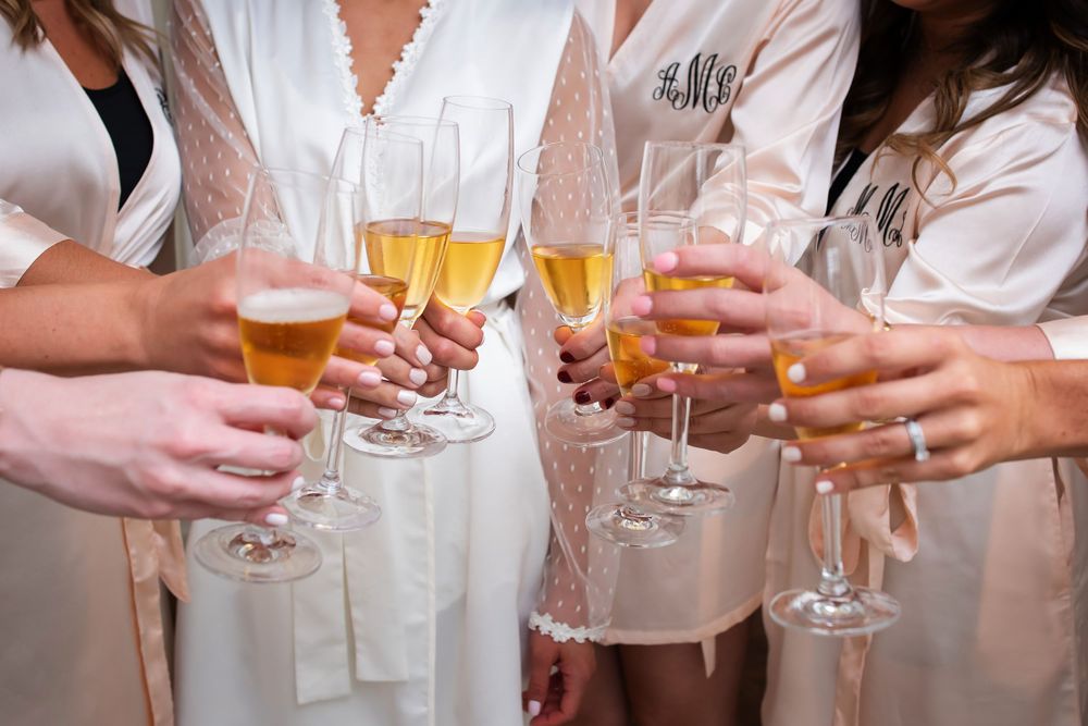 Bridesmaid toast on wedding day in Akron, Ohio.