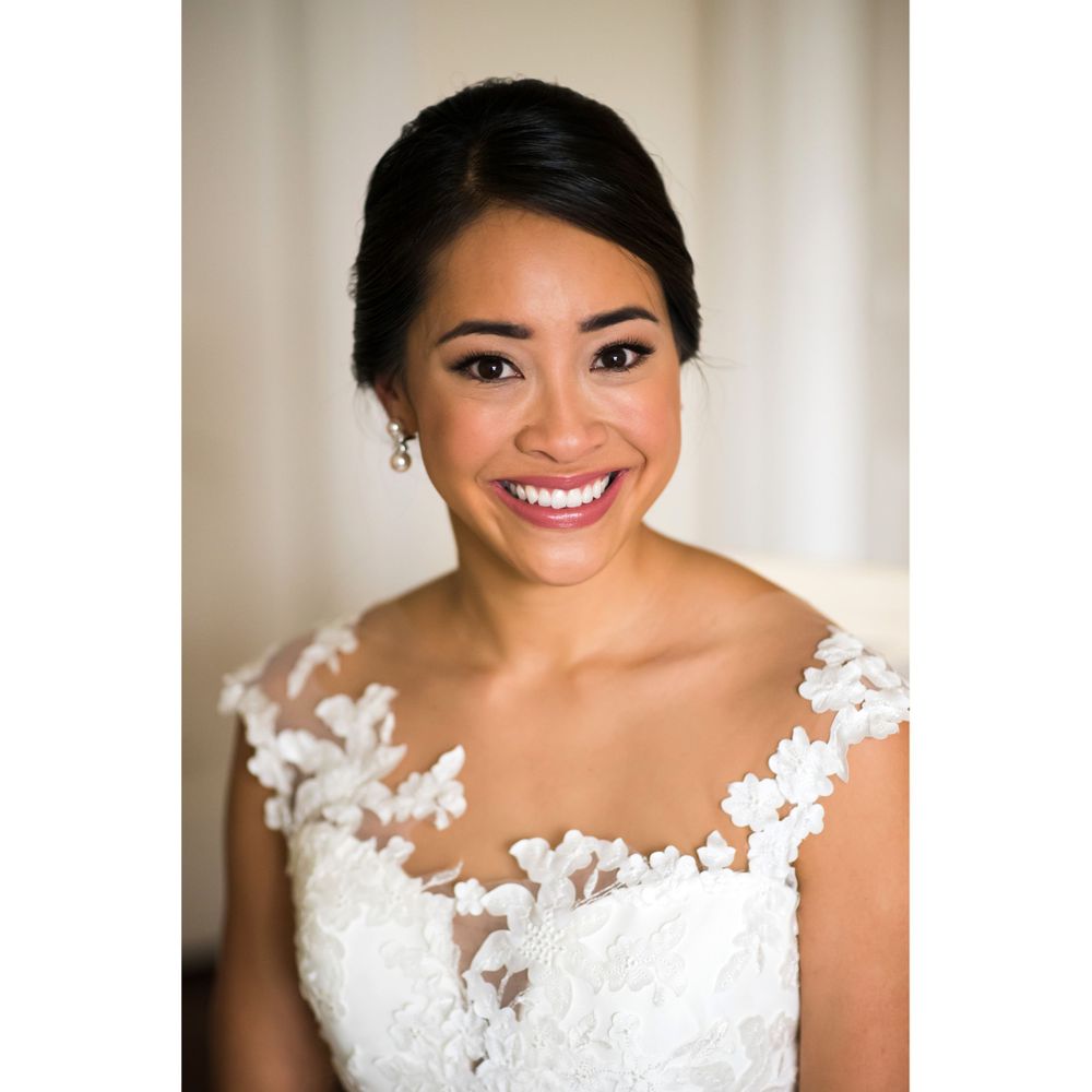 Bride smiling on wedding day in Akron, Ohio.