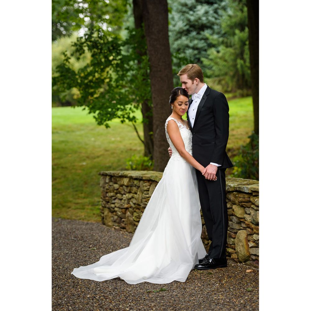Bride and groom outdoors on wedding day in Akron, Ohio.