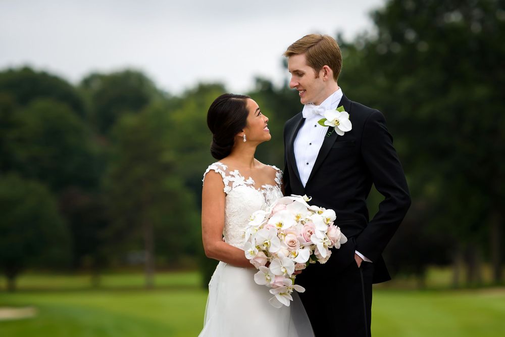 Bride and groom on wedding day at Fairlawn Country Club in Akron, Ohio.