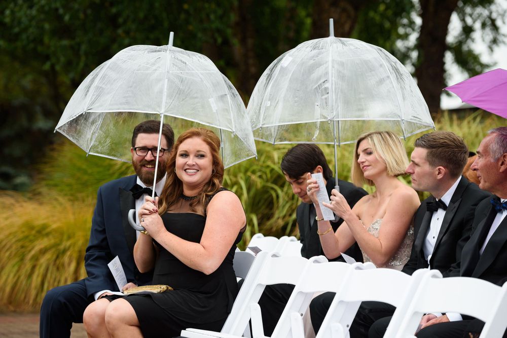 Guests prepare for outdoor ceremony on wedding day at Fairlawn Country Club in Akron, Ohio.