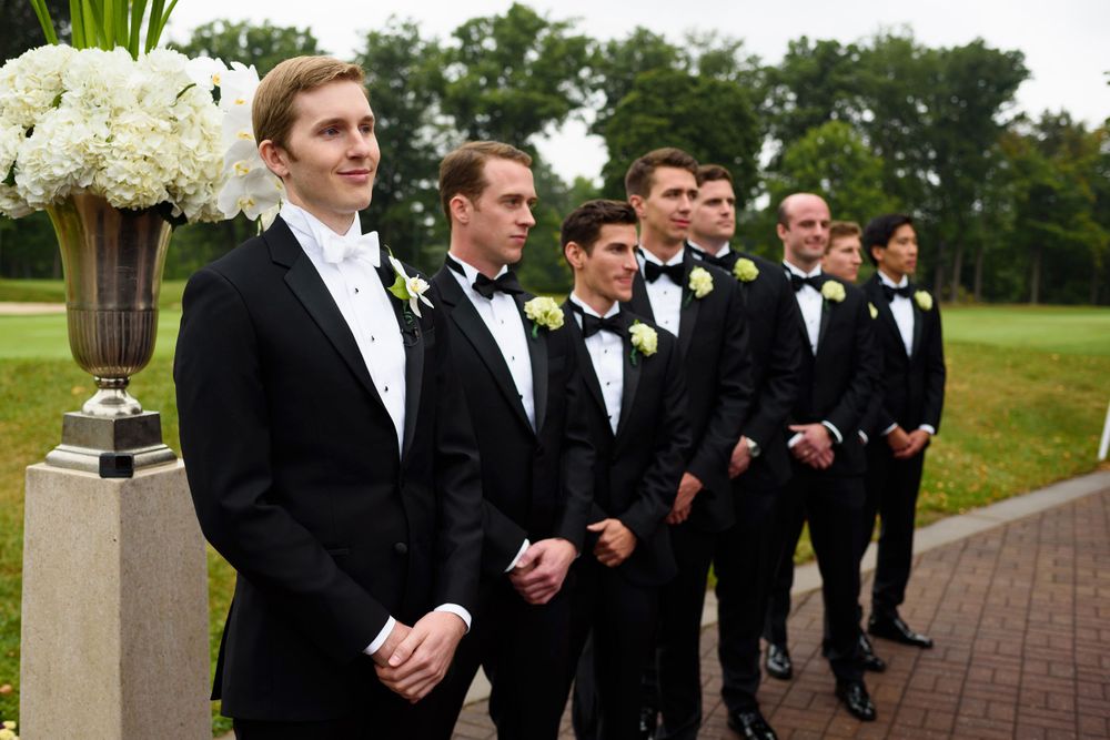 Grooms waits for bride on their wedding day at Fairlawn Country Club in Akron, Ohio.