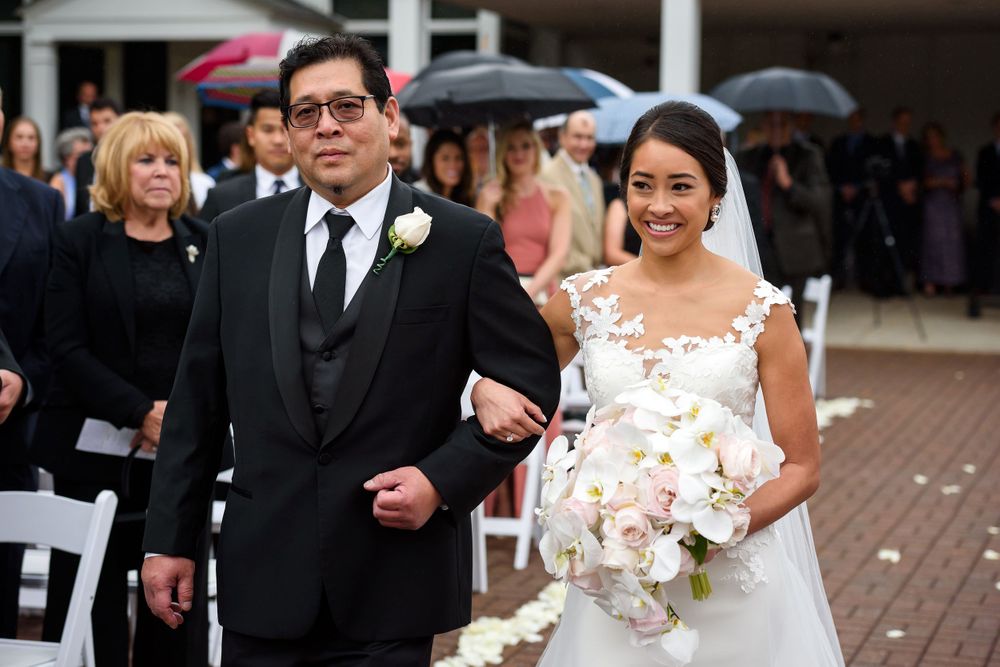 Father and bride walk aisle on wedding day at Fairlawn Country Club in Akron, Ohio.