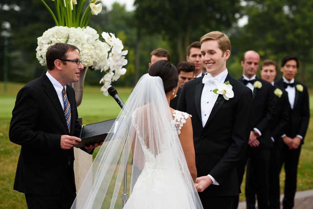 Bride and groom during wedding ceremony at Fairlawn Country Club in Akron, Ohio.