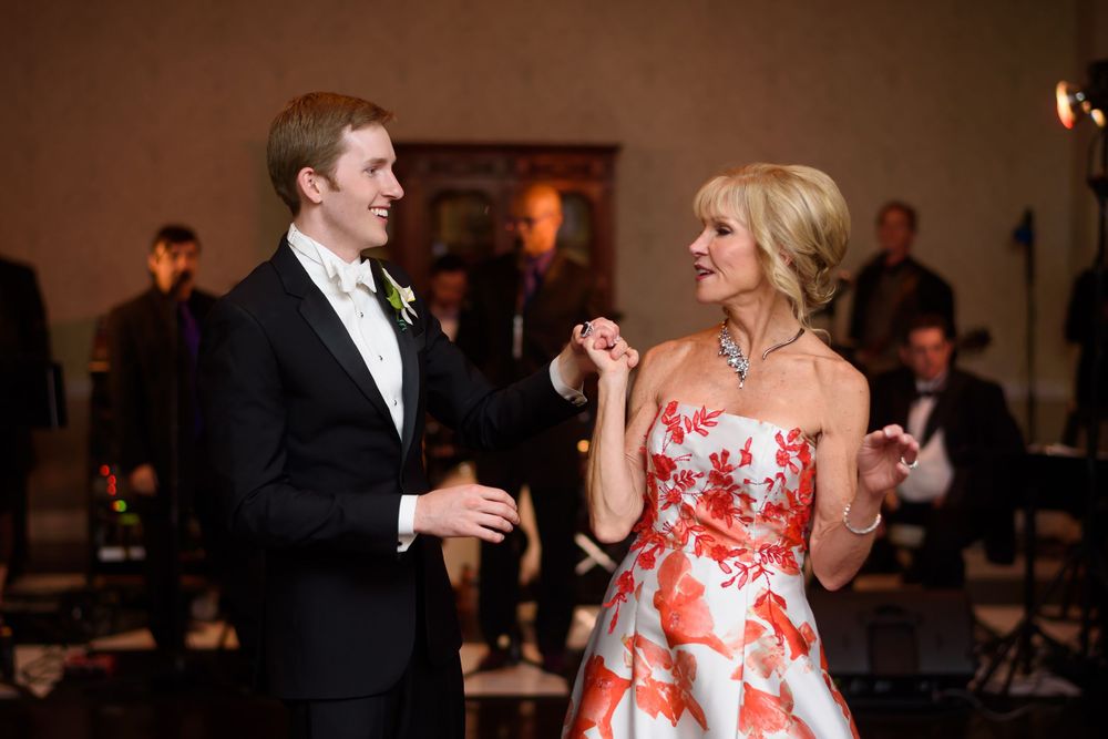 Groom and mother dance during wedding reception at Fairlawn Country Club in Akron, Ohio.