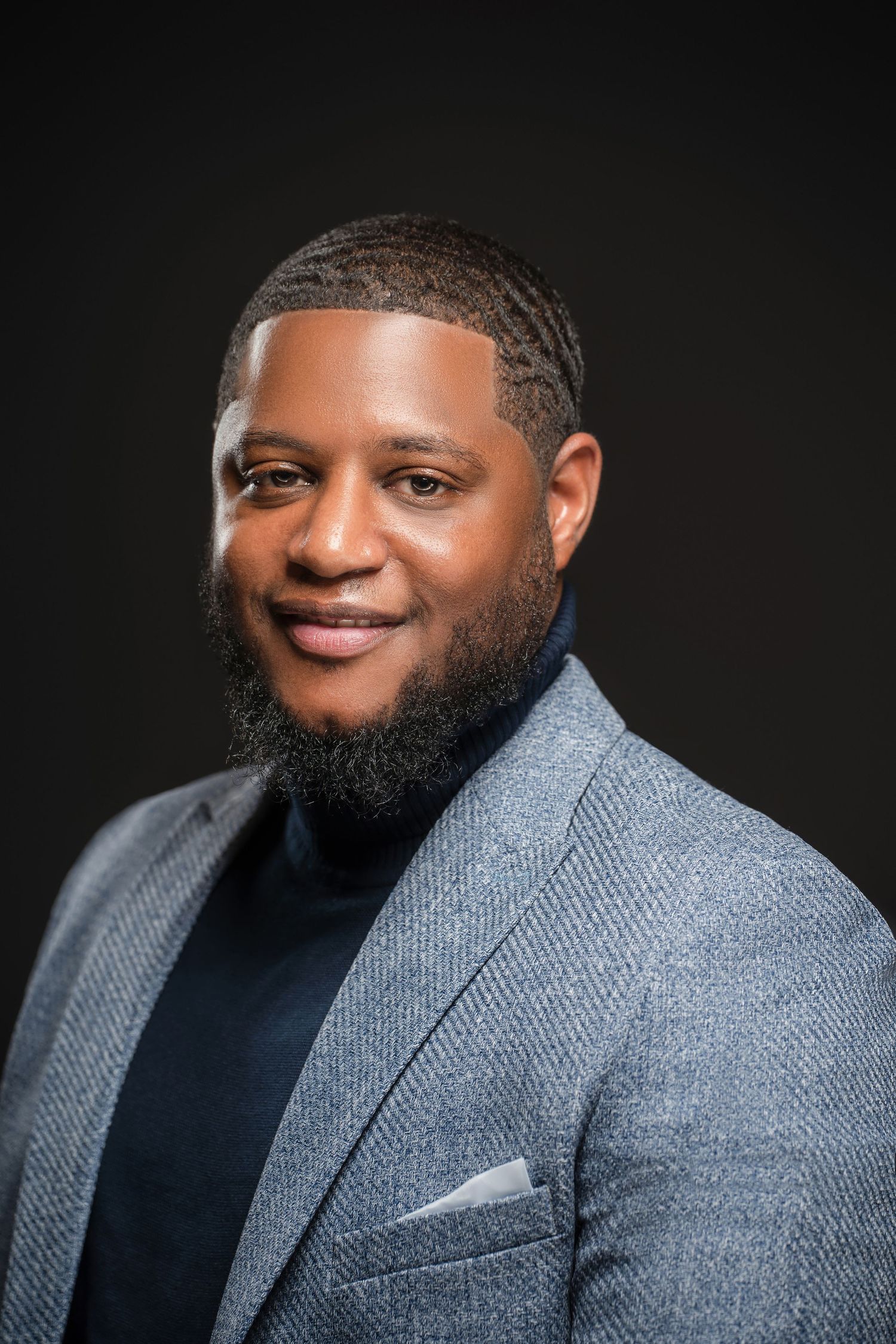 Handsome man in photography studio for branding session