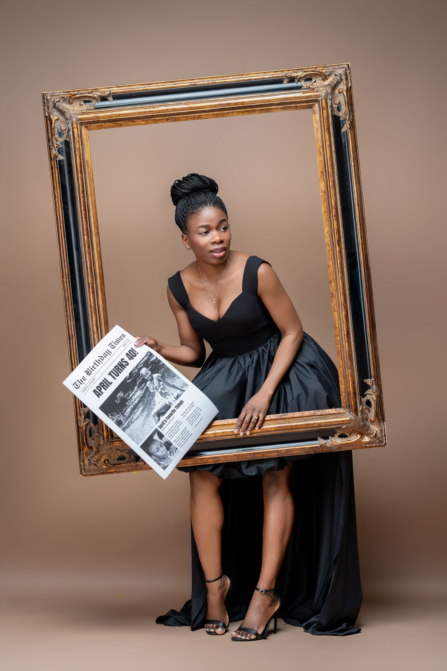 A creative photo series showing a figure in a black dress emerging through an ornate gold picture frame against brown backdrop.