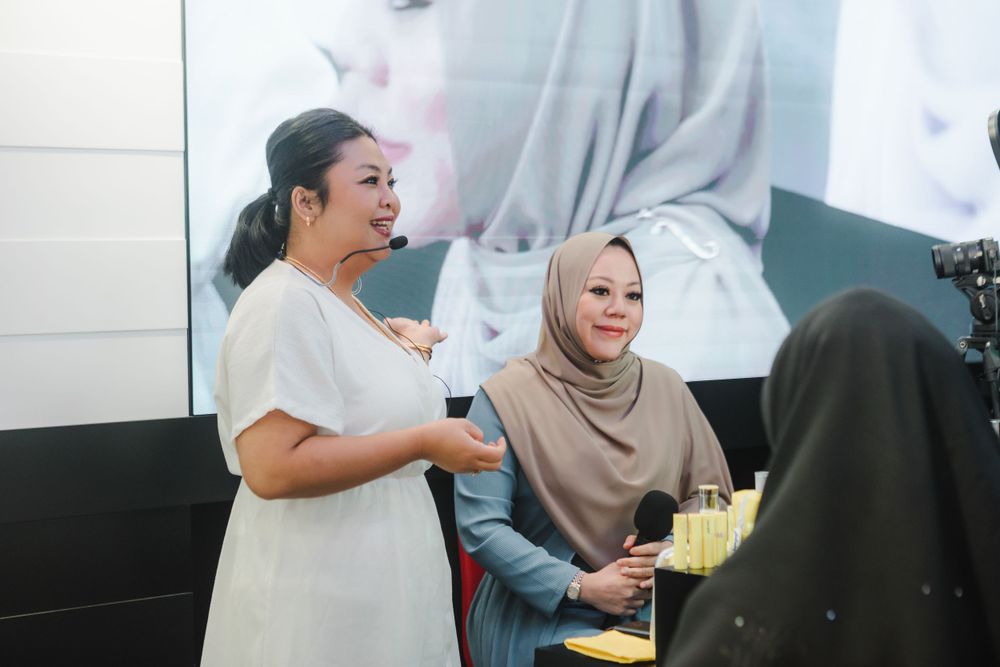 Group gathering in modern office space with casual atmosphere.