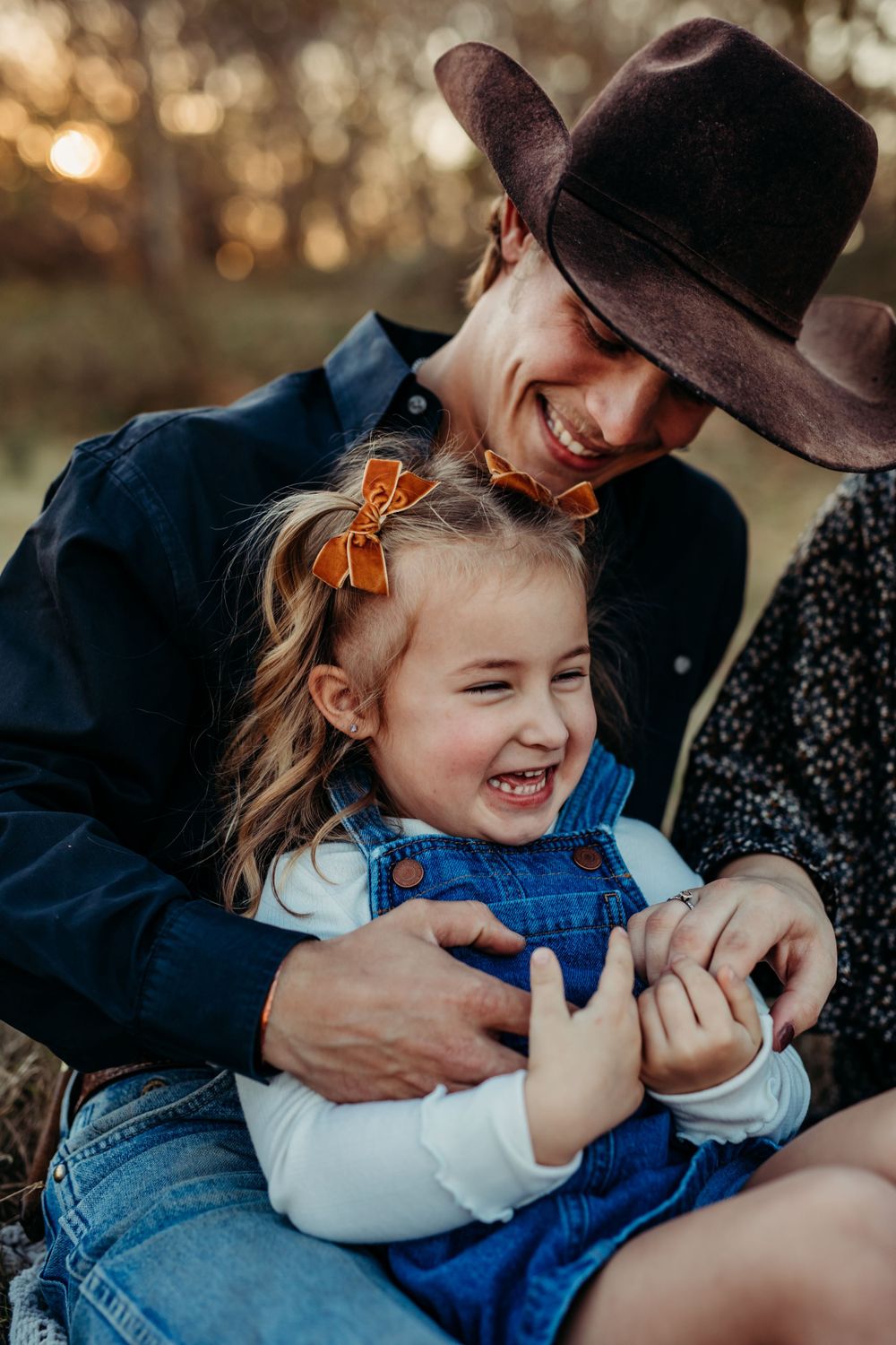 dad and daughter laughing