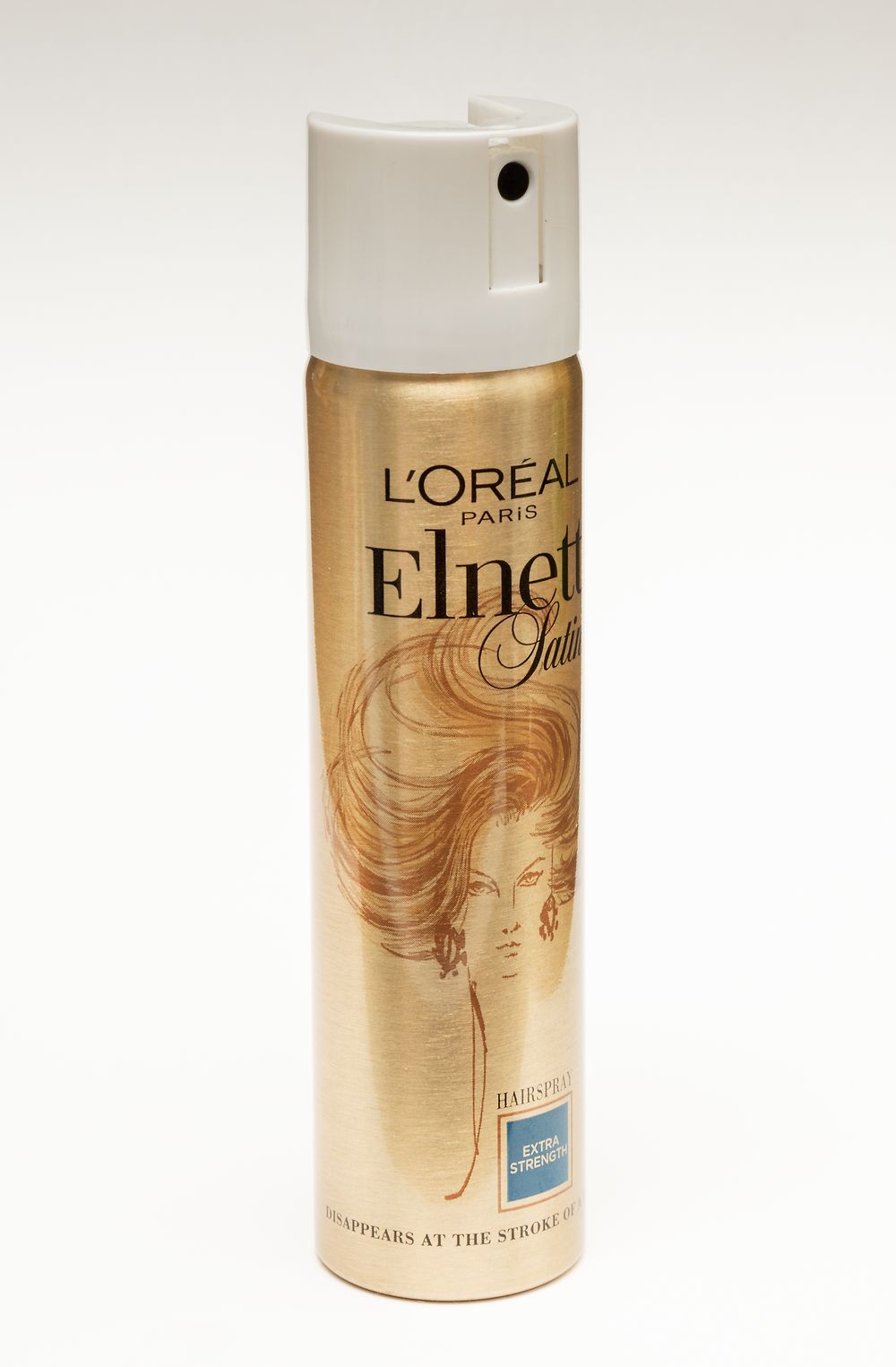 Gold L'Oreal Elnett hairspray can featuring elegant vintage-style illustration on white background.