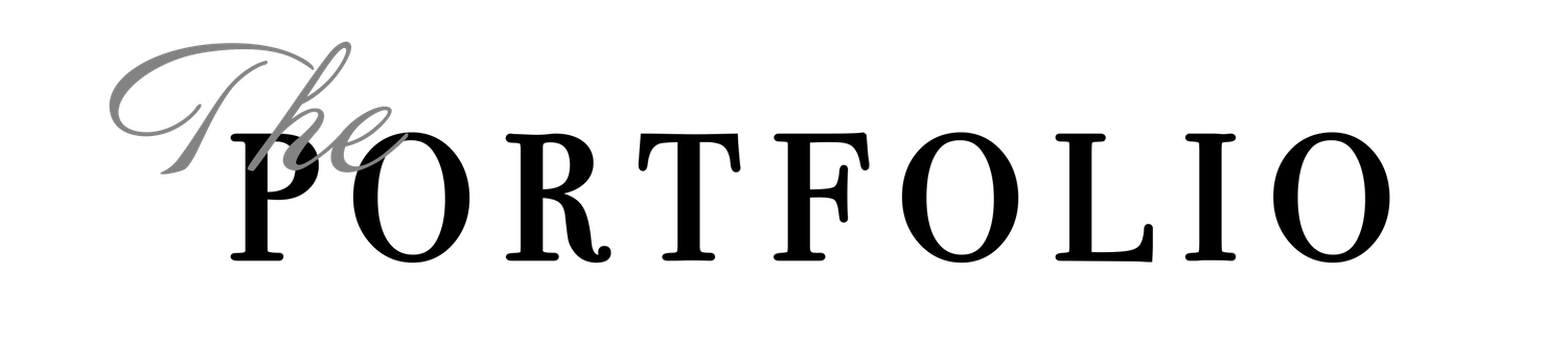 Cursive metallic text displaying 'The' in reflective silver typeface against black.