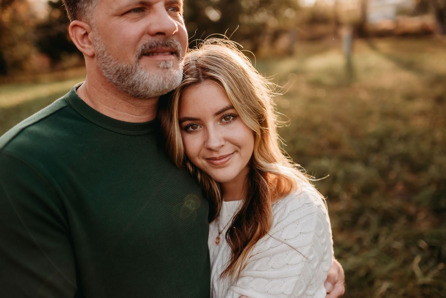 father and daughter at golden hour