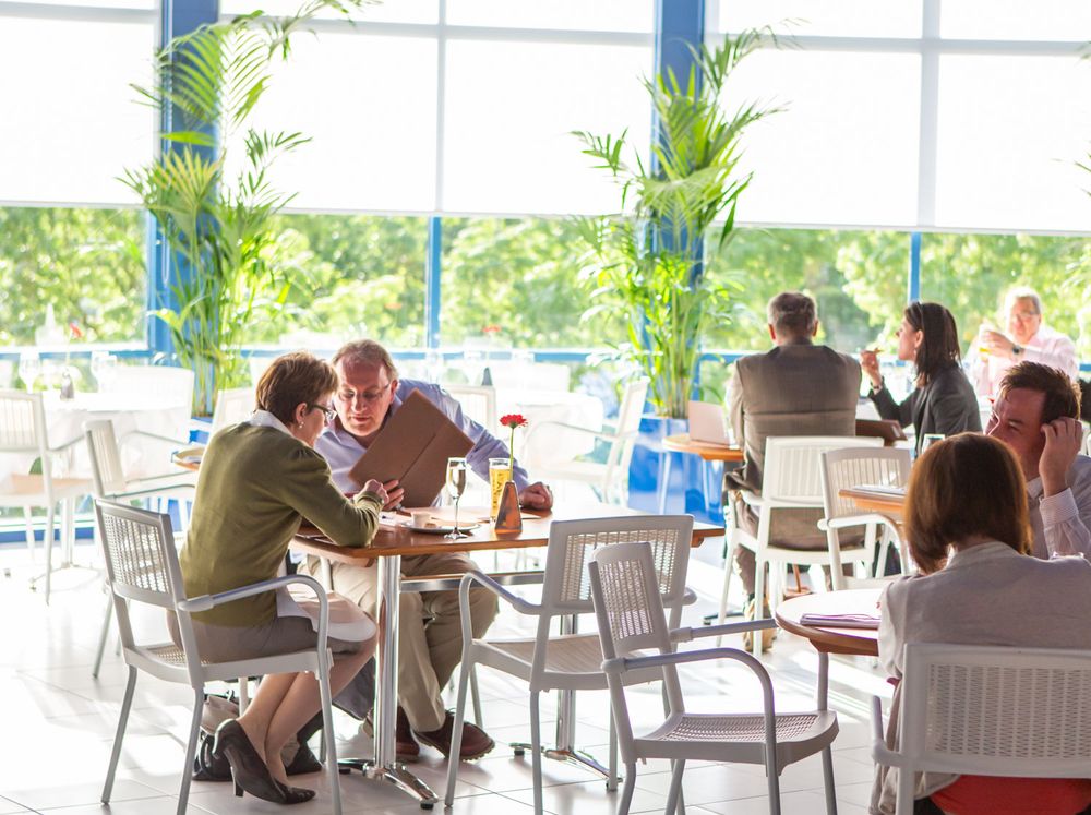Customers enjoying a meal in a modern pizza restaurant in Tunbridge Wells -2