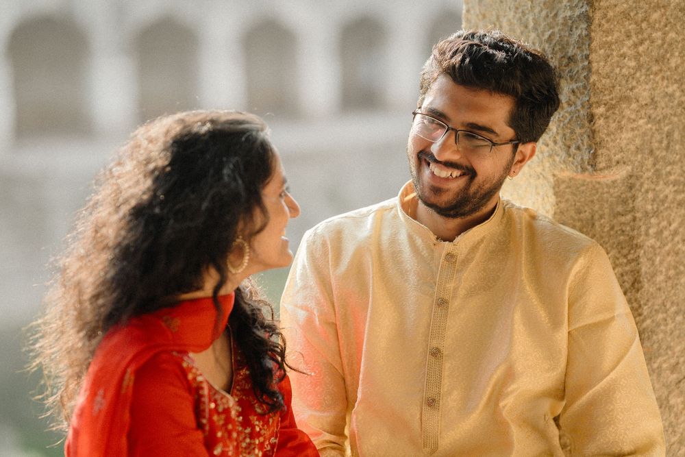 A couple shares a joyful moment in a candid split-frame photo, wearing red and cream-colored outfits.