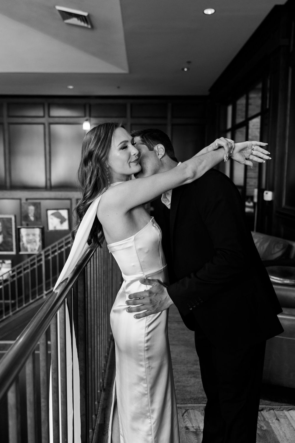 Orlando luxury wedding photographer bride and groom dancing in an elegant indoor setting.