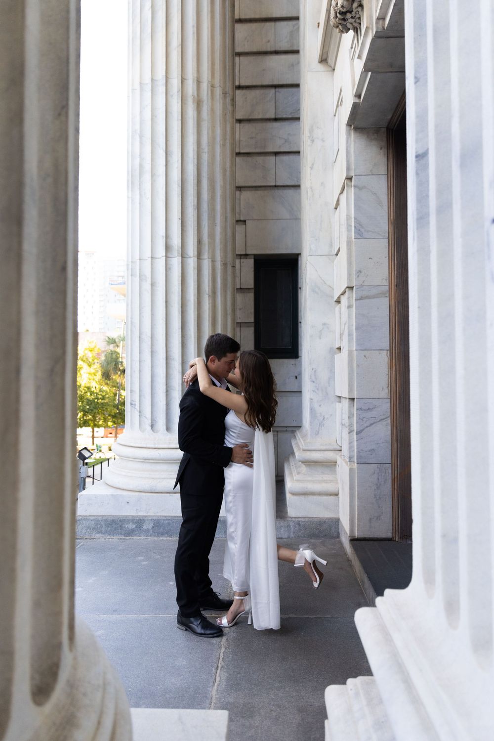 Orlando luxury wedding photographer romantic couple at a courthouse in Orlando.