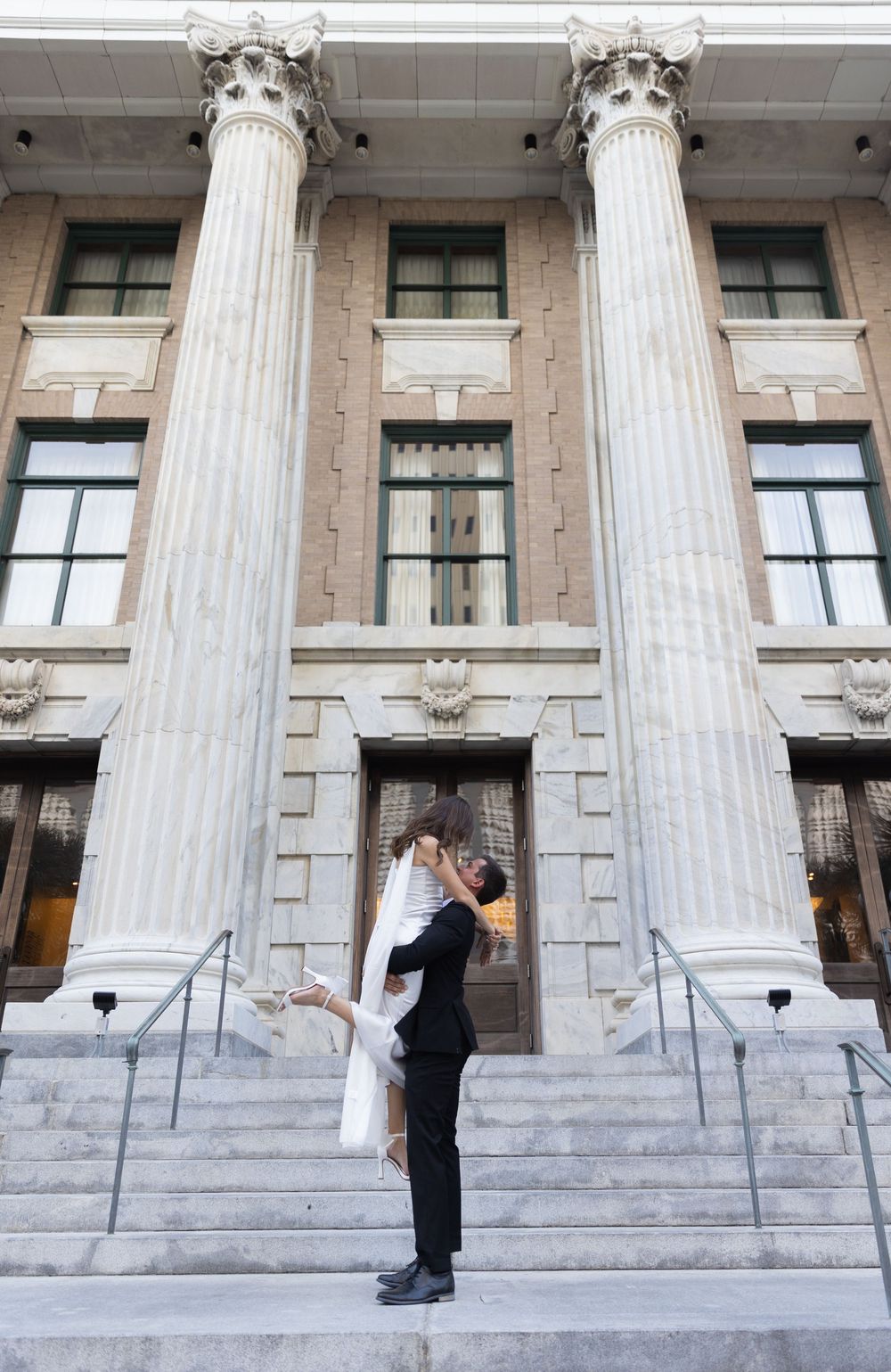 Orlando luxury wedding photographer bride and groom sharing a romantic kiss.