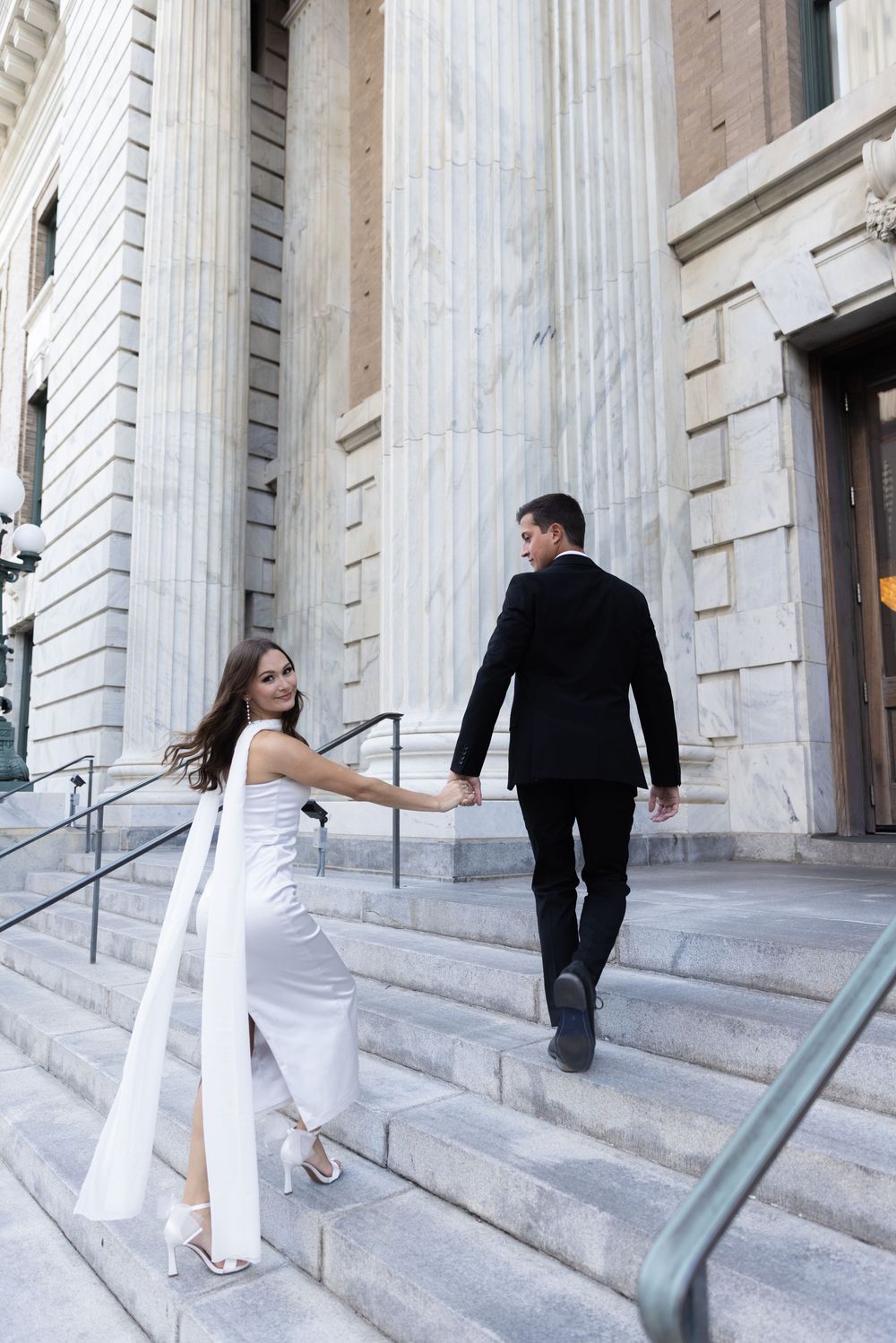 Orlando luxury wedding photographer bride and groom at a historical site for their photos.