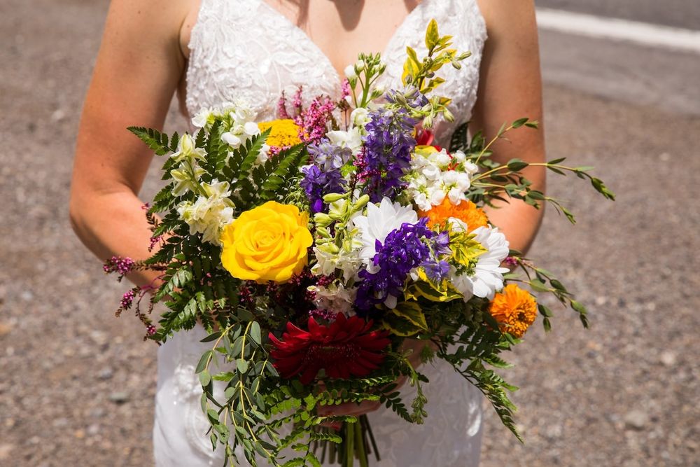 romantic summer elopement in our Colorado with couple smiling and having a great time