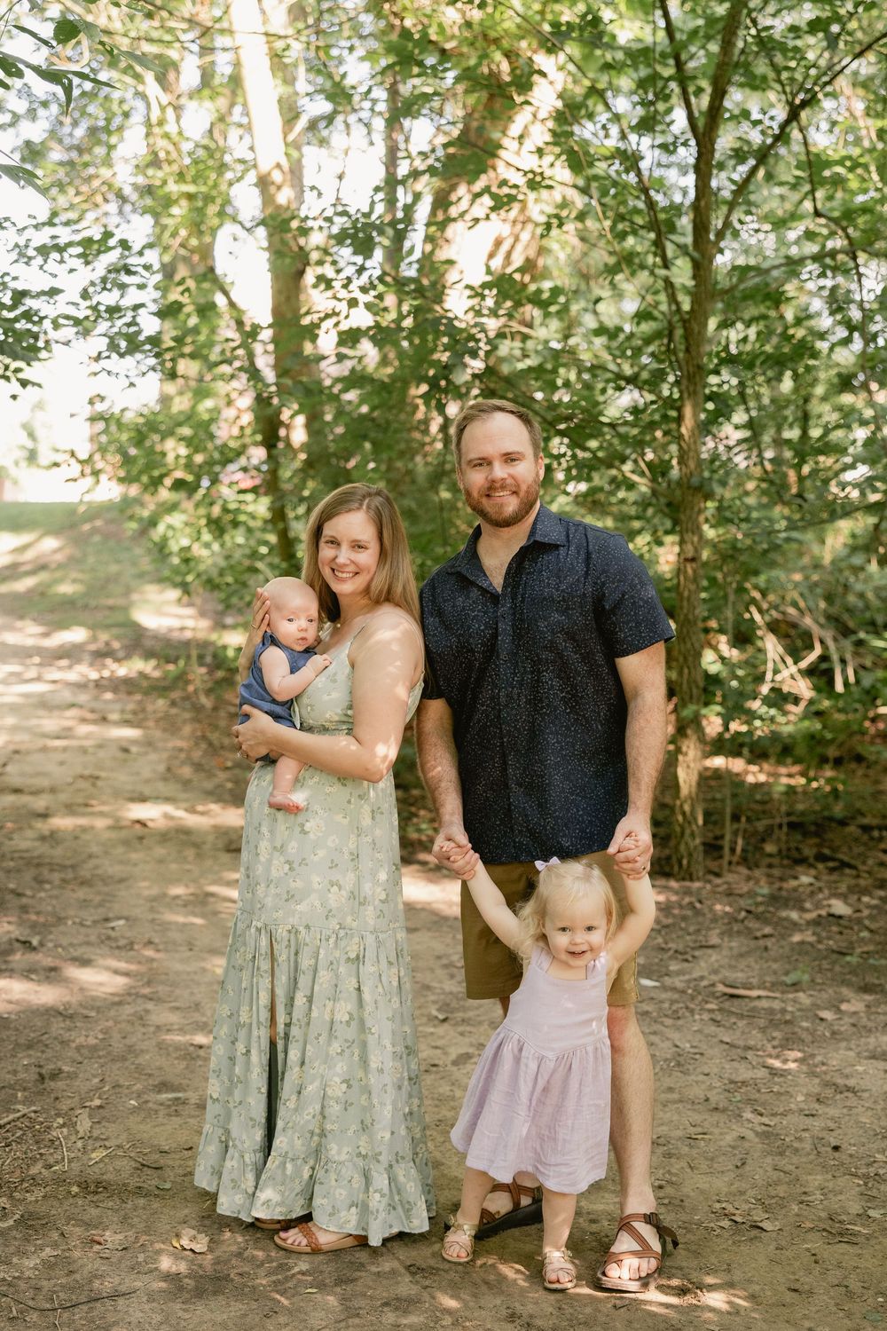 Family portrait series in a wooded setting during golden hour.