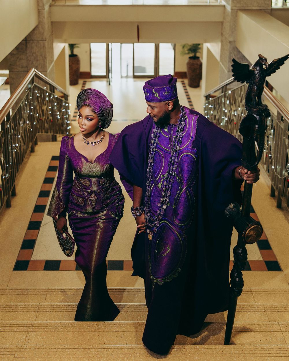 A sequence of artistic fashion photos showing models in elegant purple and black ensembles posing in a hallway.