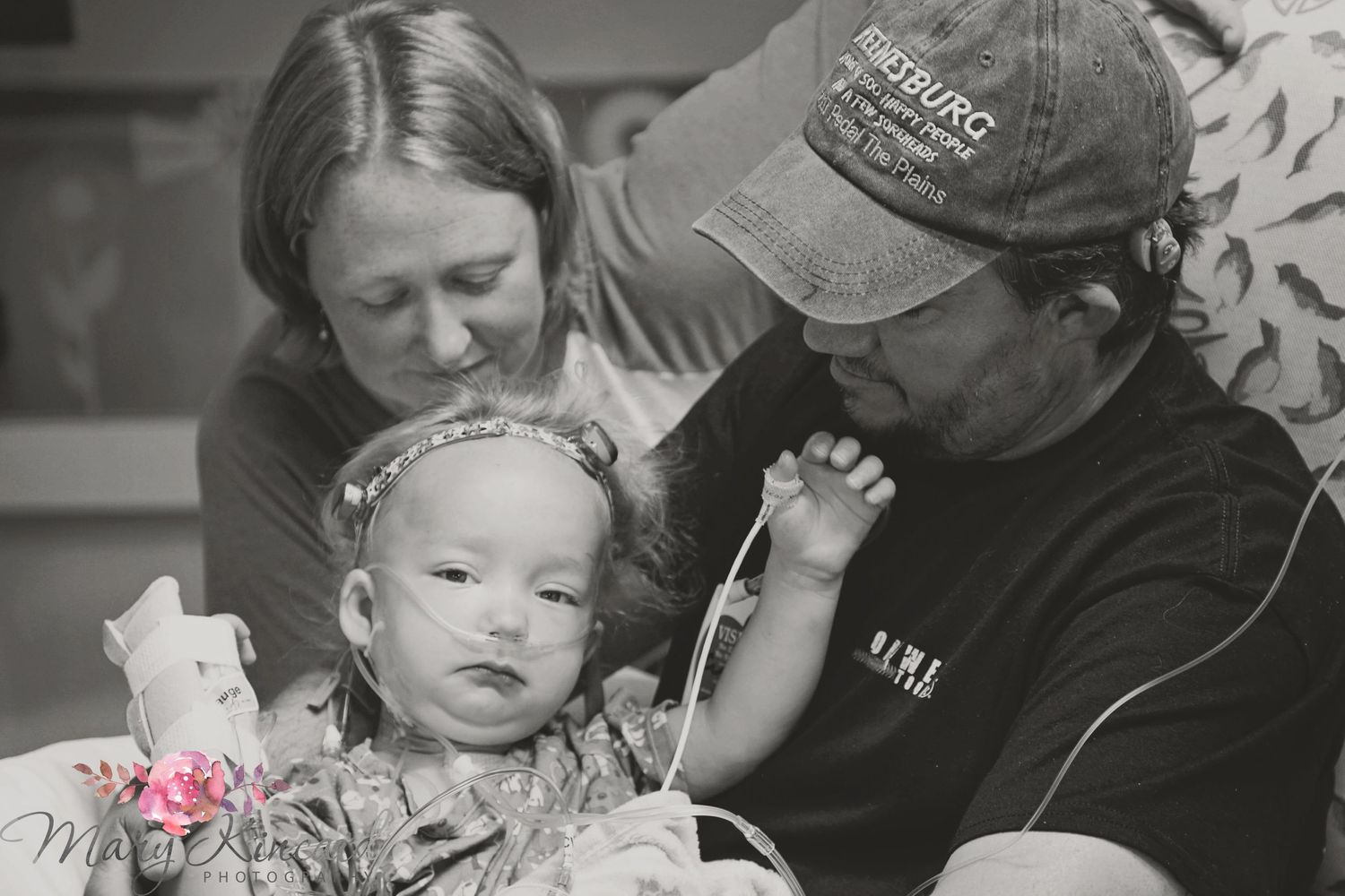Little girl and her parents right after having open heart surgery to fix her Congenital heart Defect