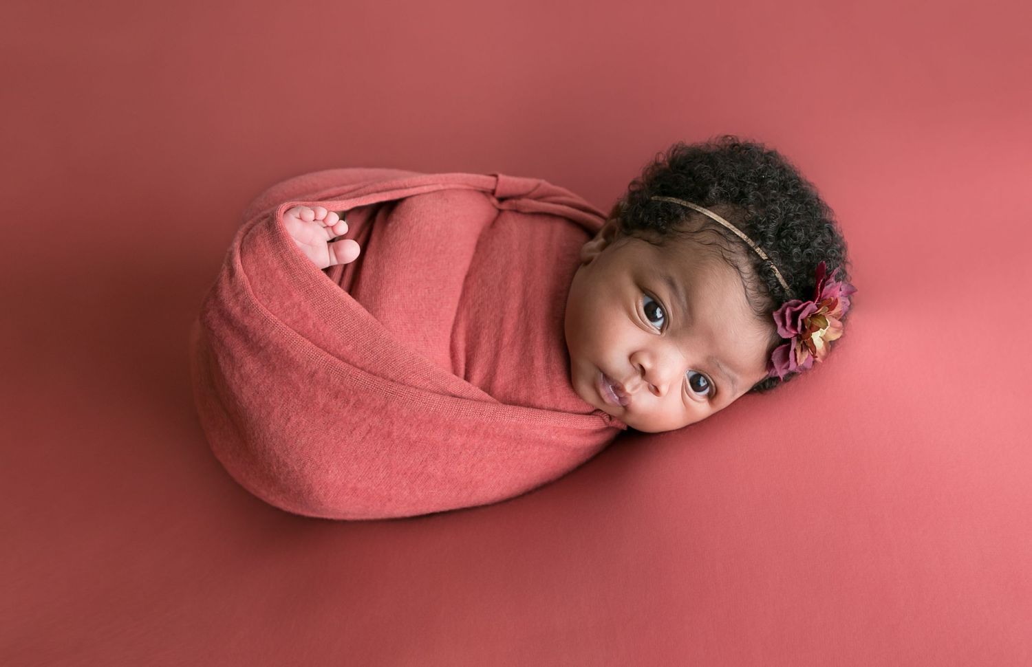 Orlando Newborn Photography, girl on soft pink blanket