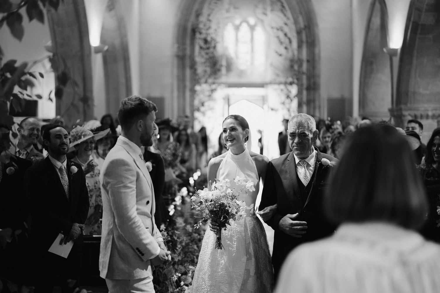 bride and groom seeing each other for the first time at the church alter at st Nicholas church in Oxfordshire
