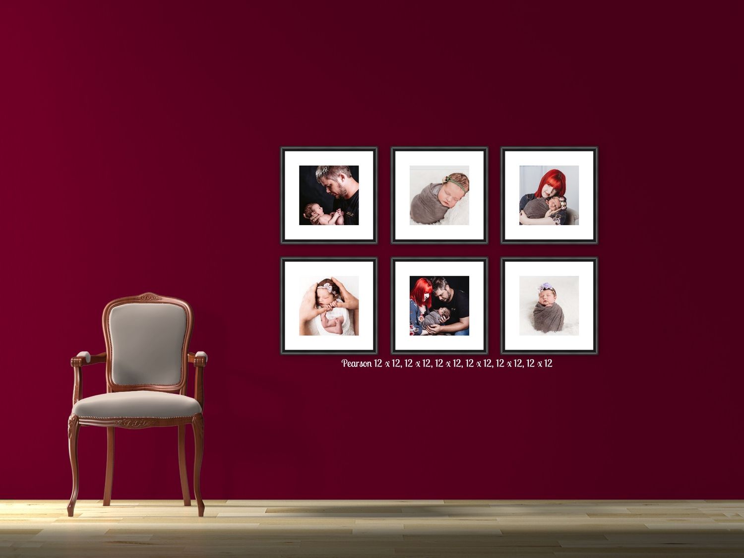 Gallery wall display with six white frames against a deep burgundy wall with an elegant gray chair.