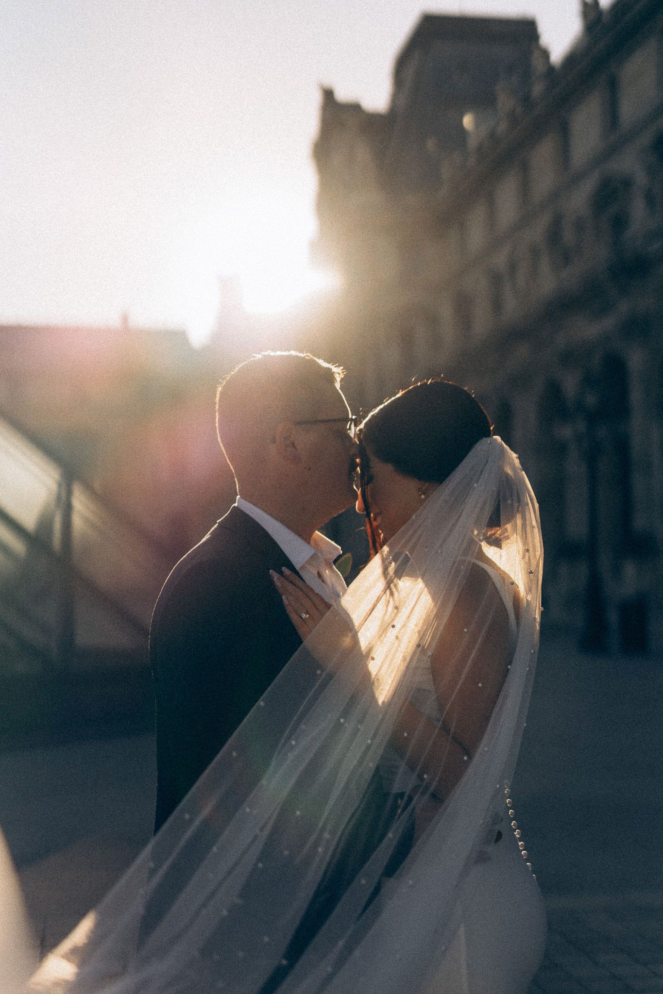 Couple posing during their elopement in Paris