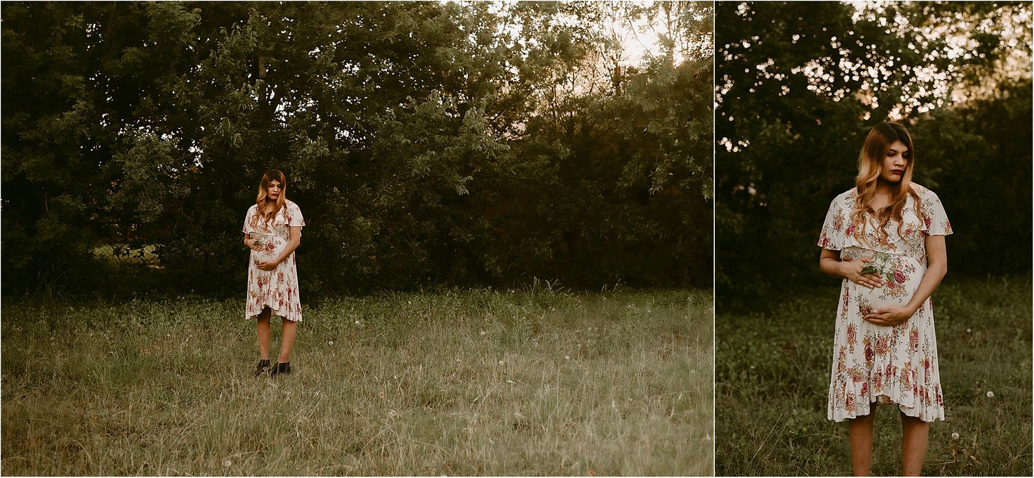 Sunset maternity photos in a field showing full-length shots in a floral dress.