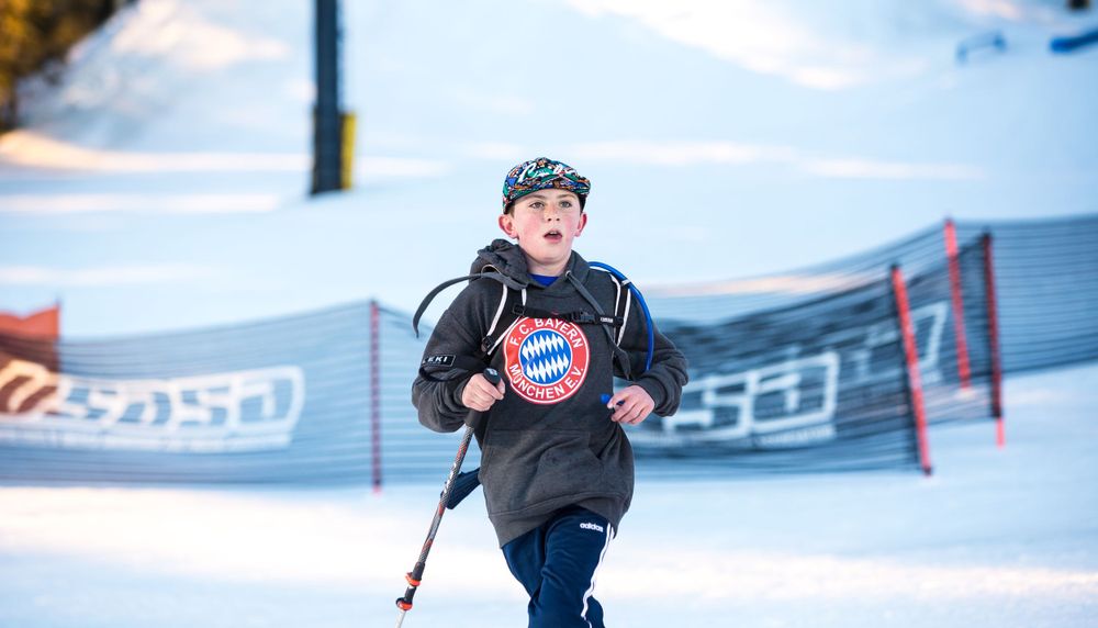 A runner shows their excitement after finishing the 2020 GORE-TEX Kahtoola Uphill.