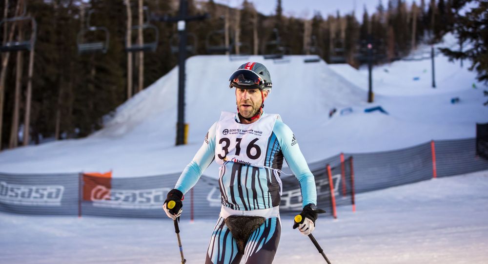 A skier glad to have finished the 2020 GORE-TEX Kahtoola Uphill.
