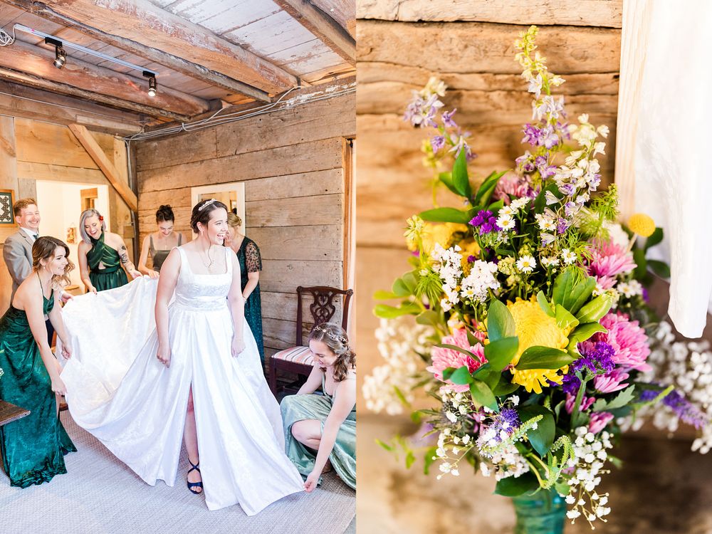 Wedding party gathering in a rustic barn with colorful floral arrangements.