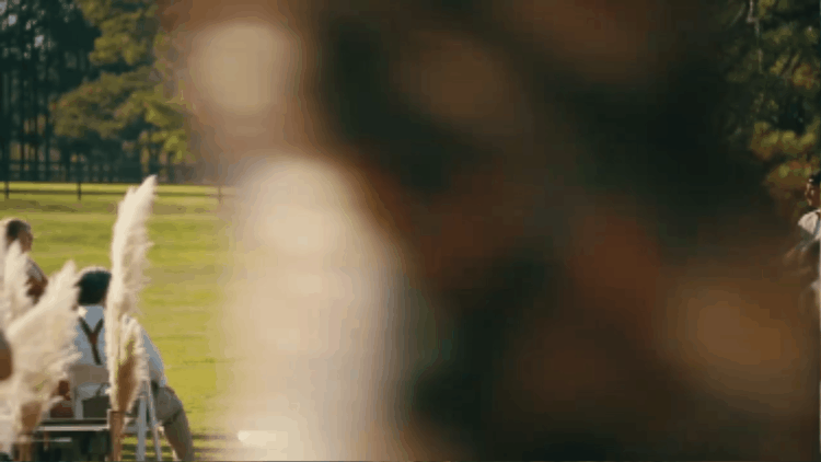 Gif of people walking in front of camera at a wedding