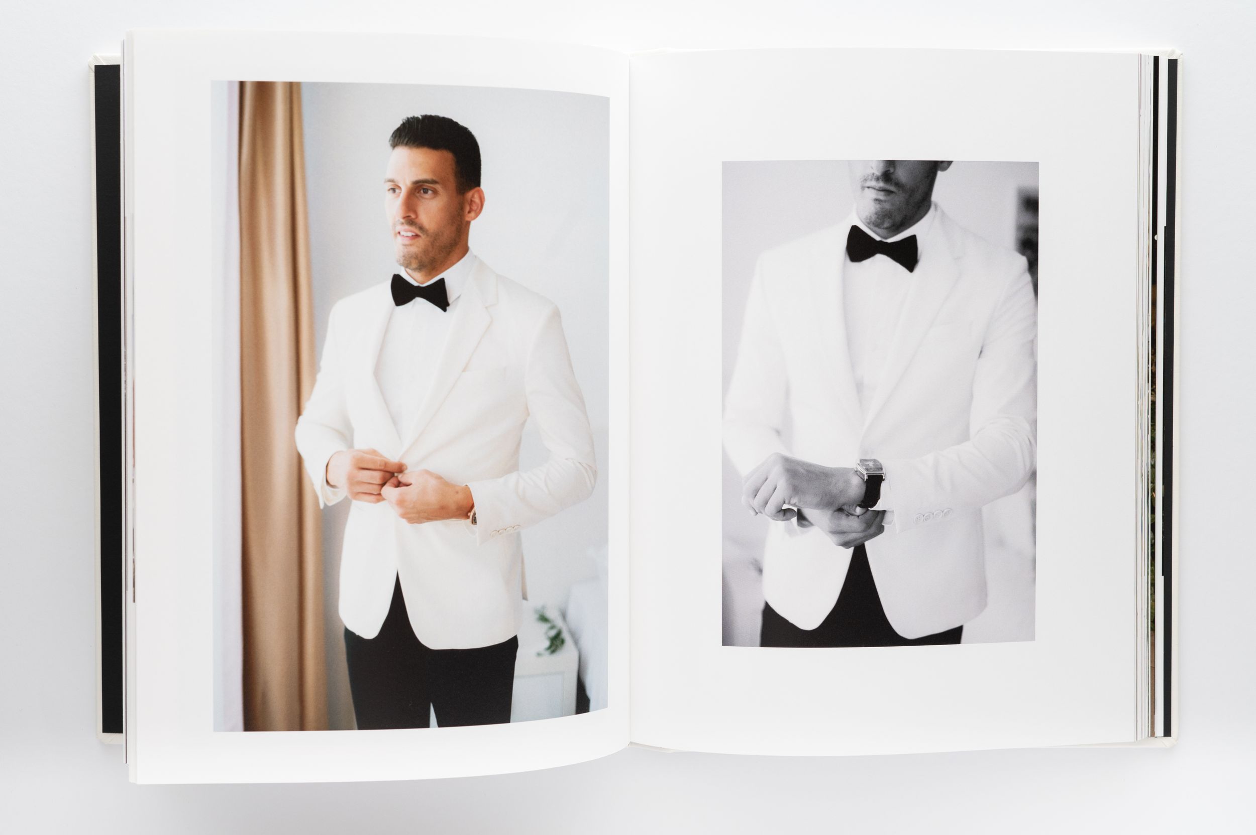Wedding album spread featuring formal attire details in black and white theme.