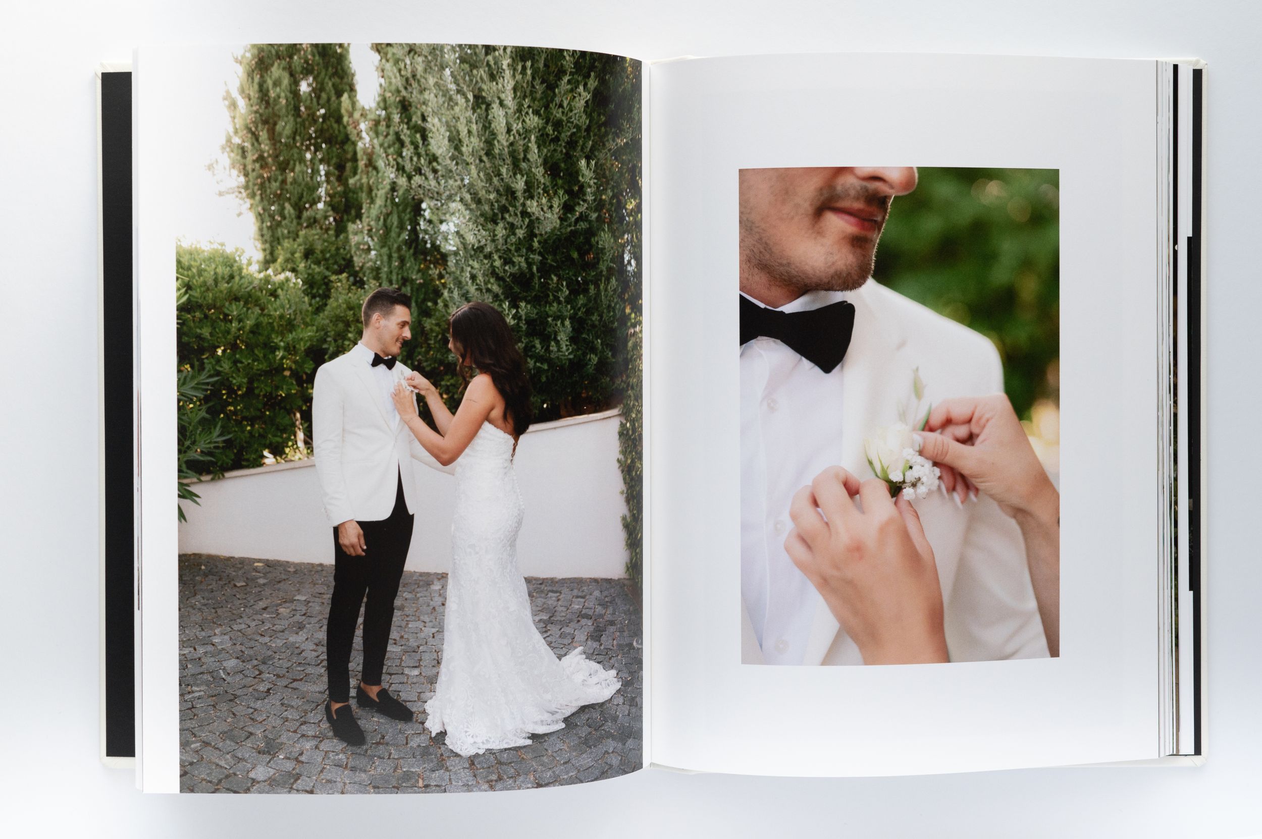 Wedding album spread showing romantic outdoor ceremony photos and detail shots.