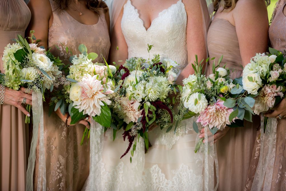Wedding florals dahlias, sweet peas and roses