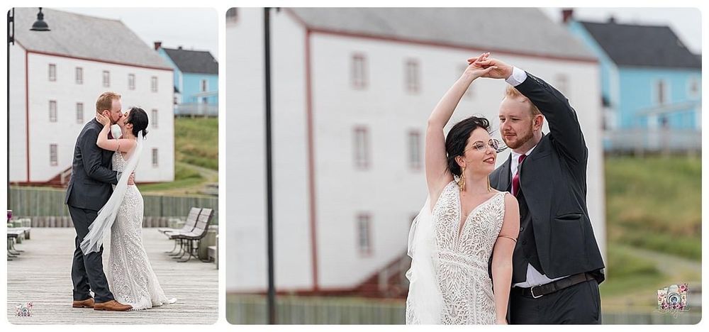 Romantic wedding dance poses on a wooden boardwalk with coastal buildings in the background.