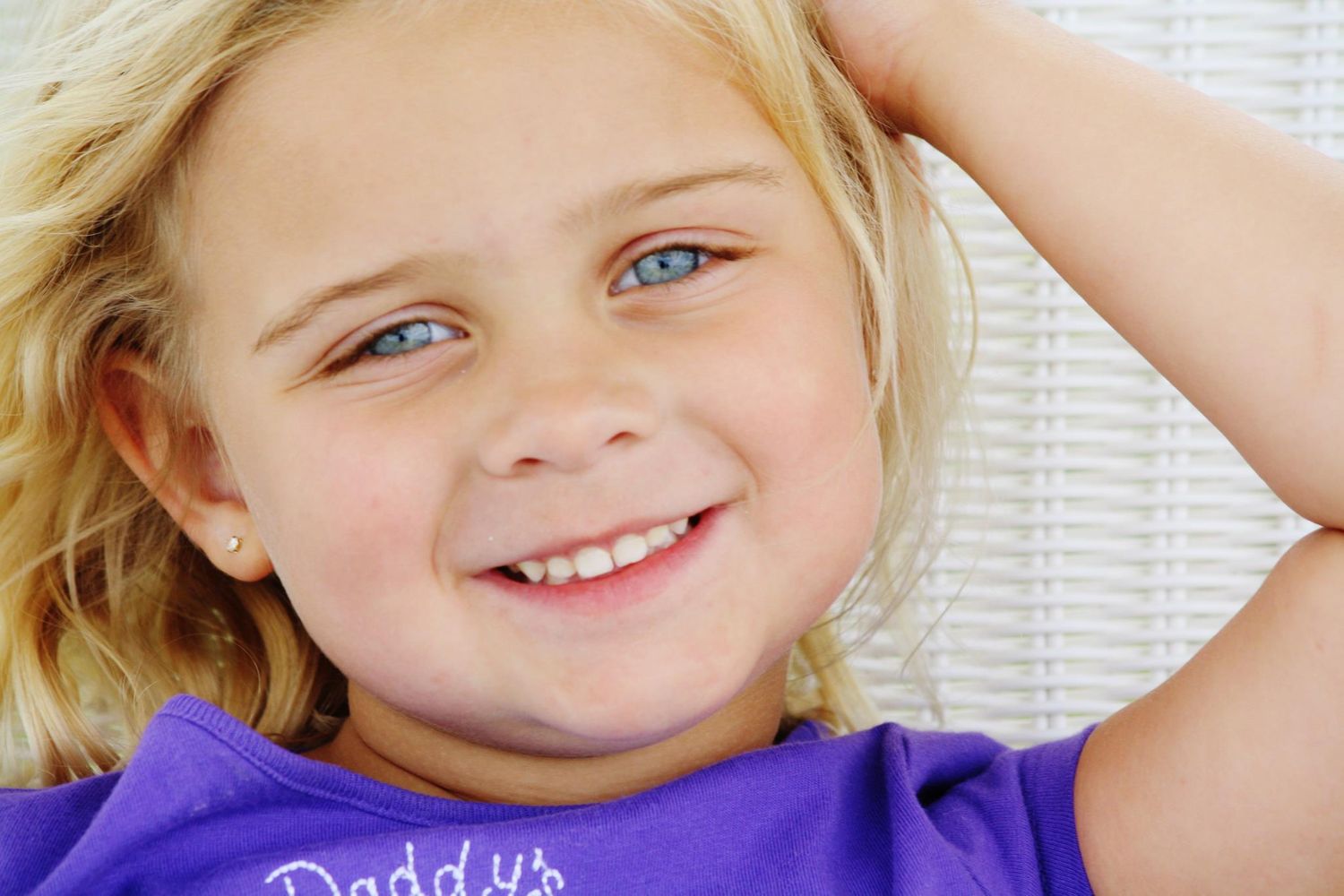 Series of cheerful portraits with natural lighting against white background.