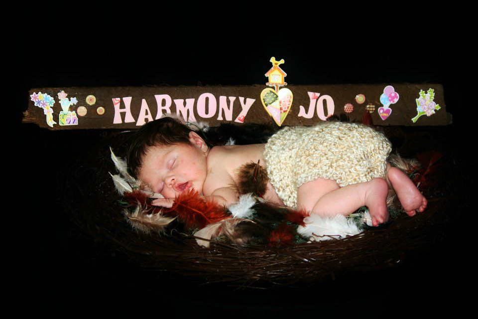 Decorative text reading 'Harmony Jo' with whimsical design elements.