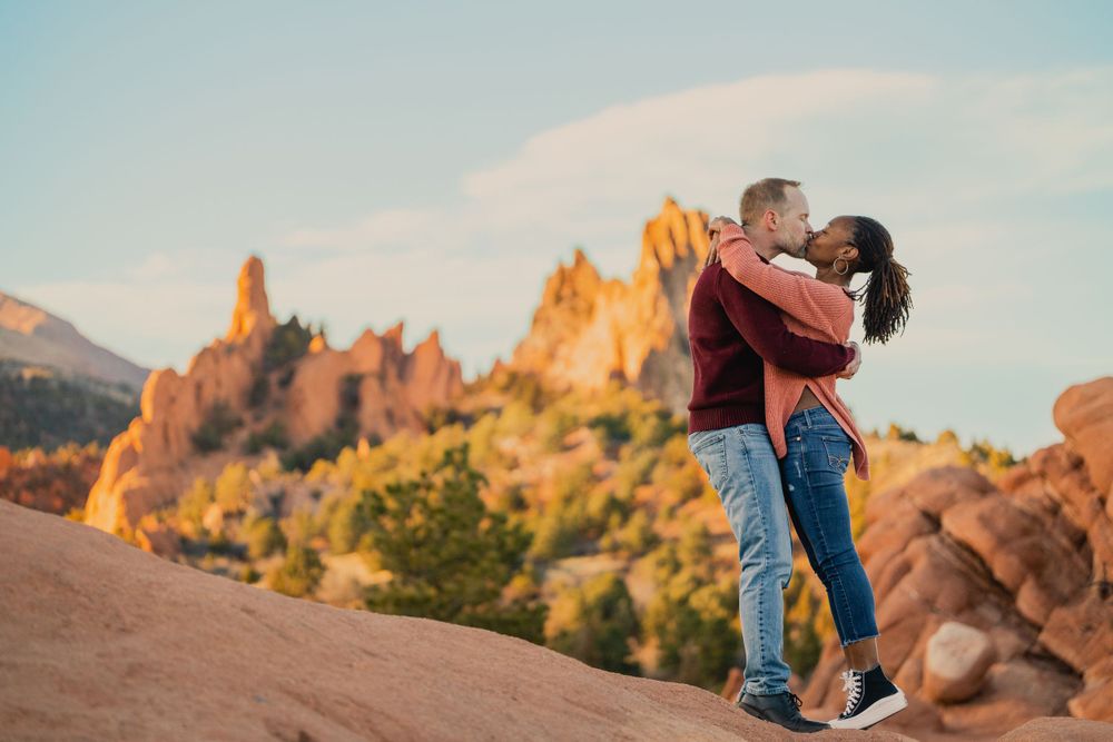 Engagement photography that beautifully captures their connection in front of Garden of the Gods in Colorado Springs