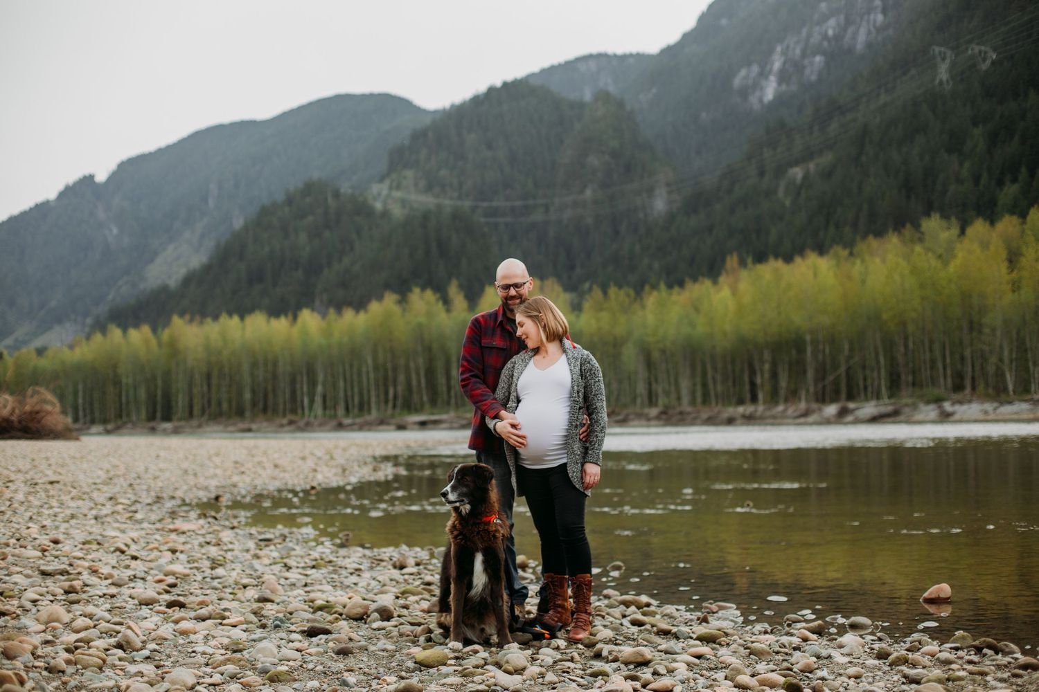Pregnant woman with husband and dog at the Squamish Estuary.