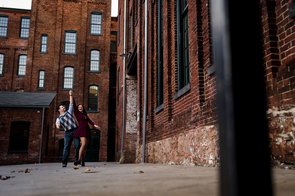 Industrial brick buildings create geometric patterns in urban architecture.