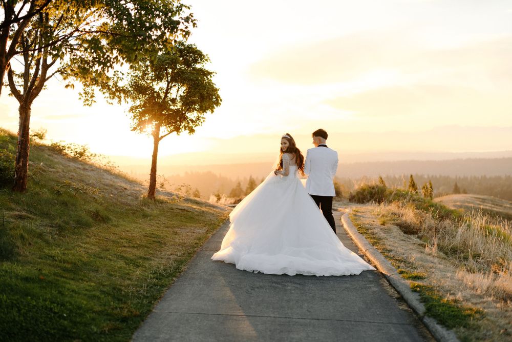 Bride and Groom going off into the sunset at Newcastle Golf Course