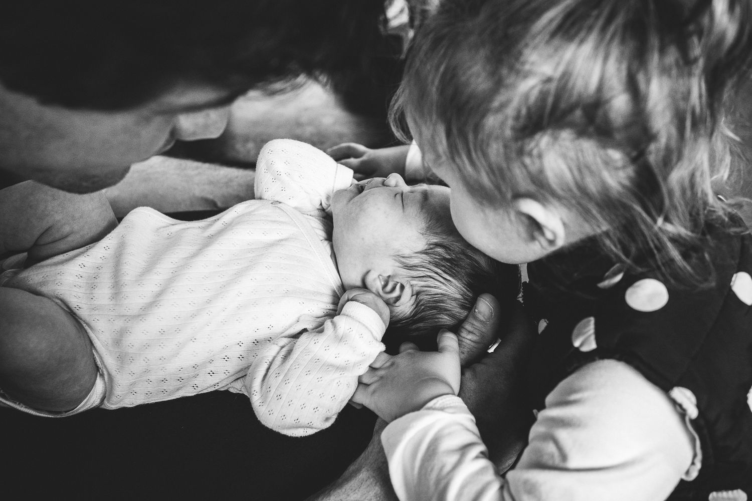 Capturing an almost 2 year old with her newborn sibling isn't as easy as it might seem.