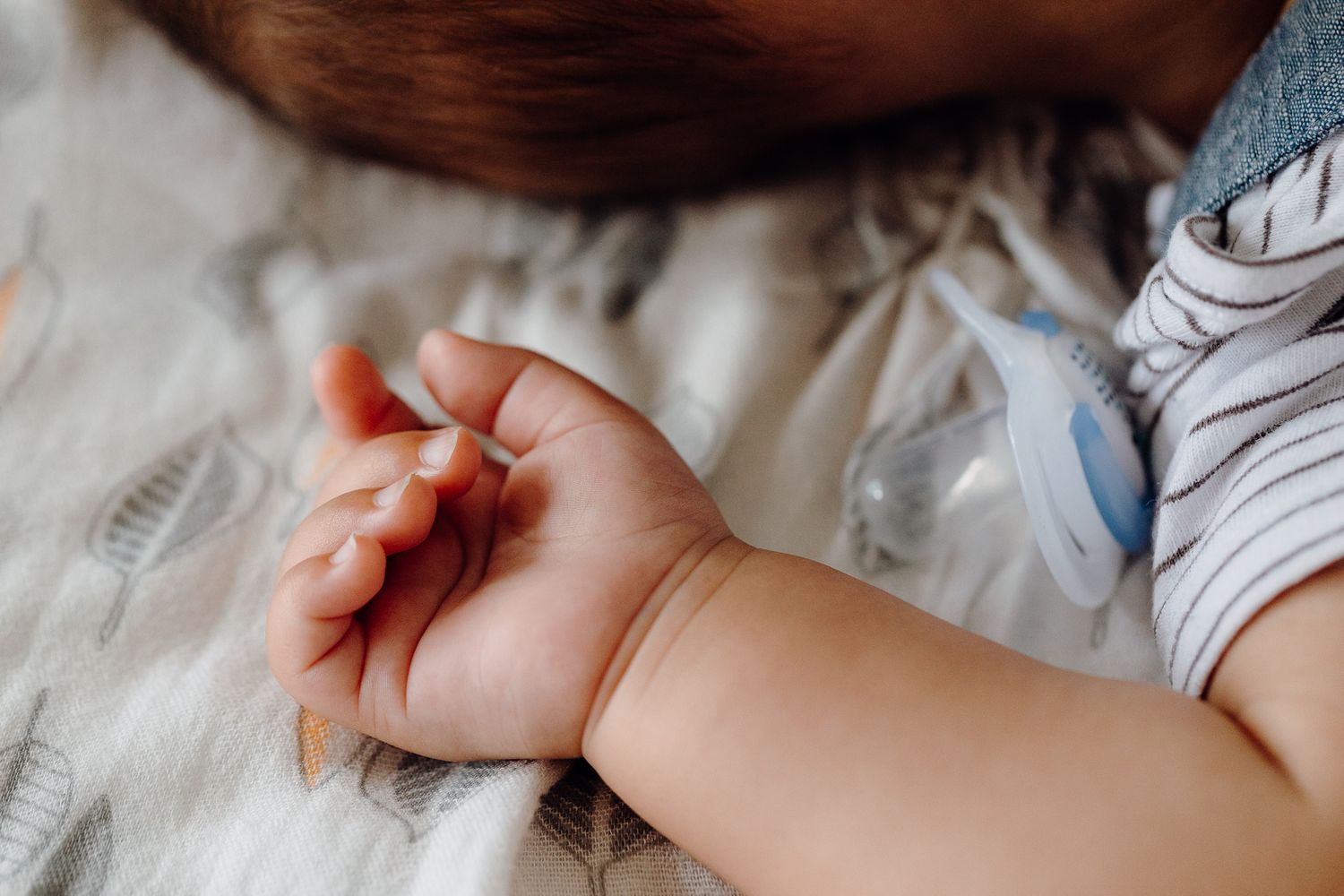 Those delicious baby fingers, those lines on the wrist, the dummy that's been spat out.