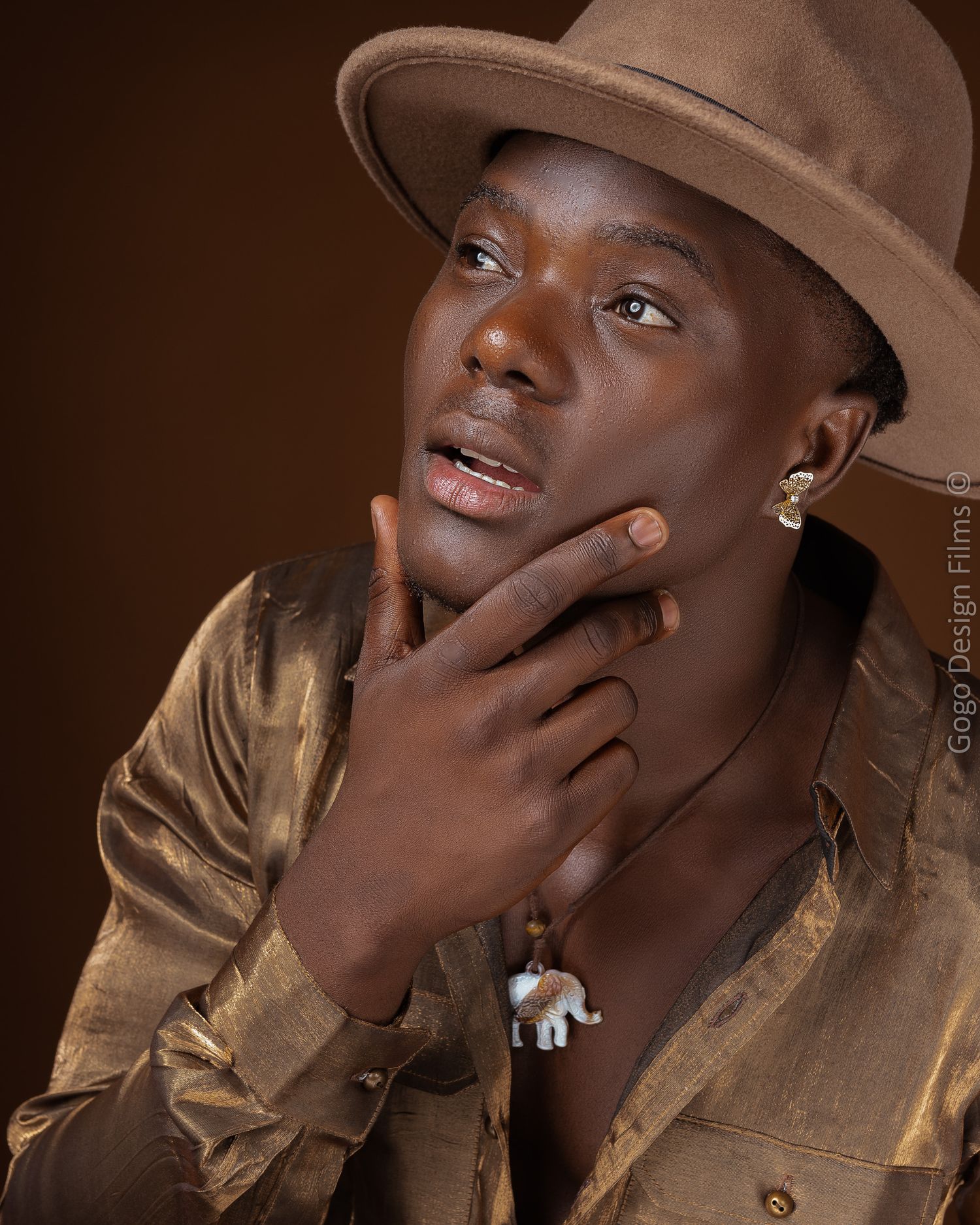 Headshot of Handsome Dark skin african male model -  Gogo Design Photography