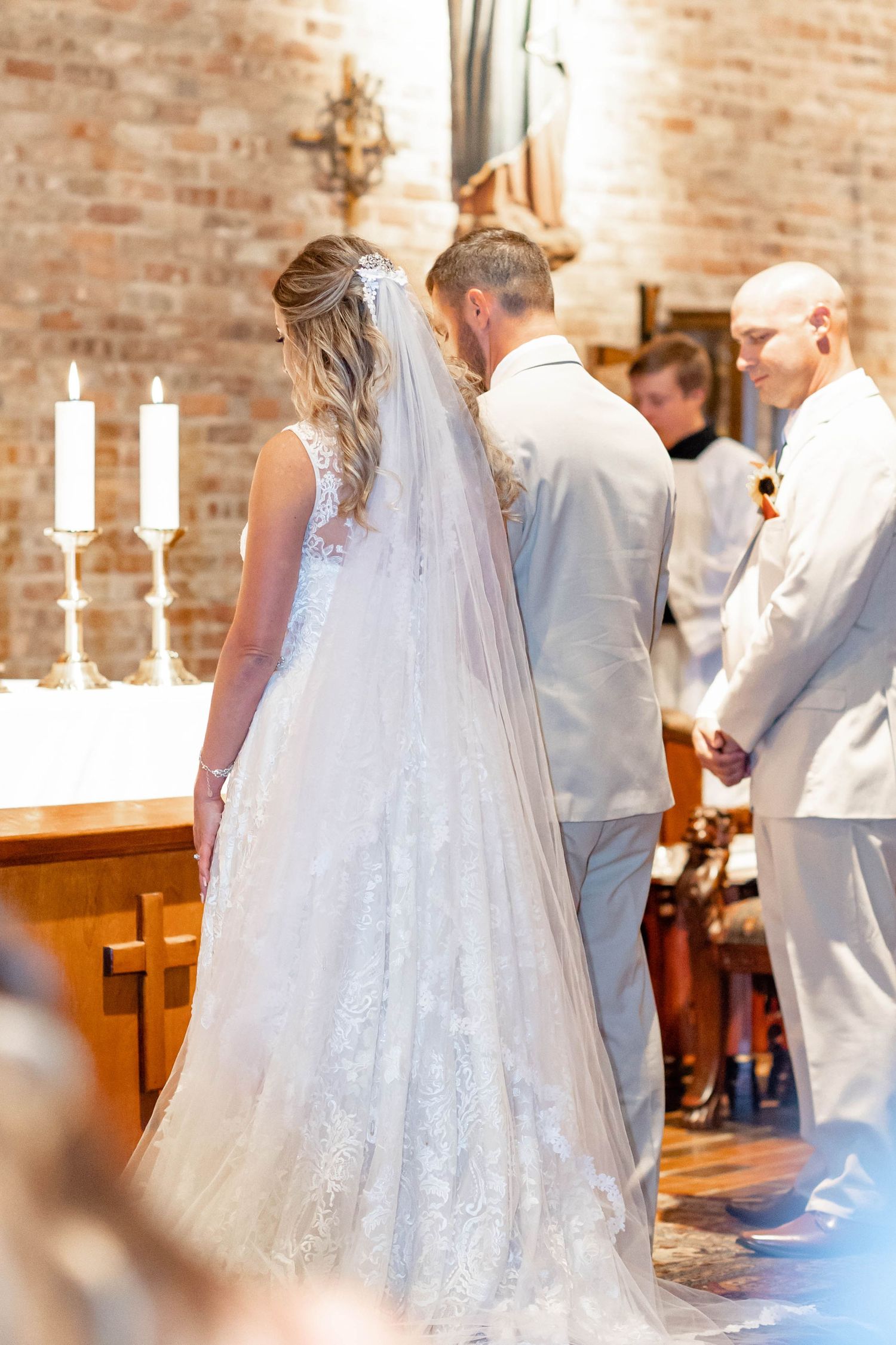 bride and groom at altar